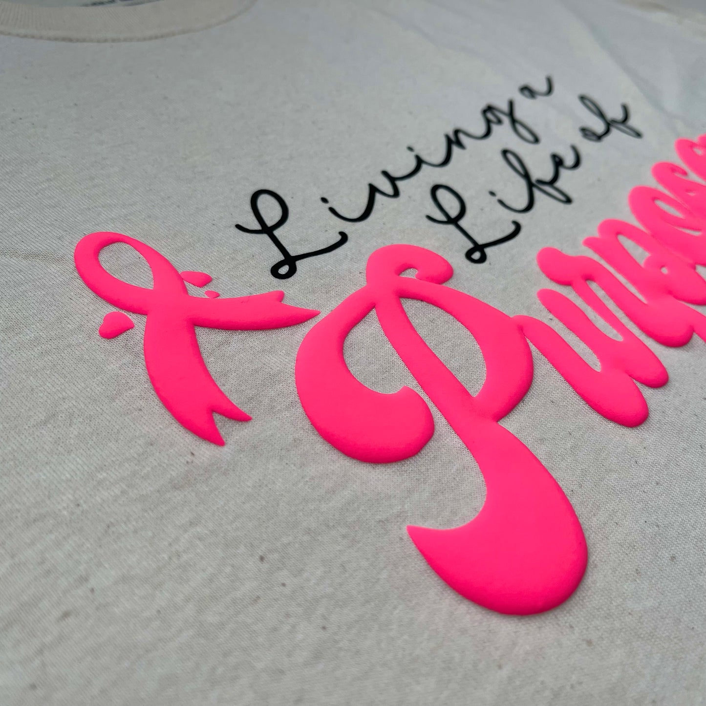 Living A Life Of Purpose Tee (Breast Cancer Awareness)